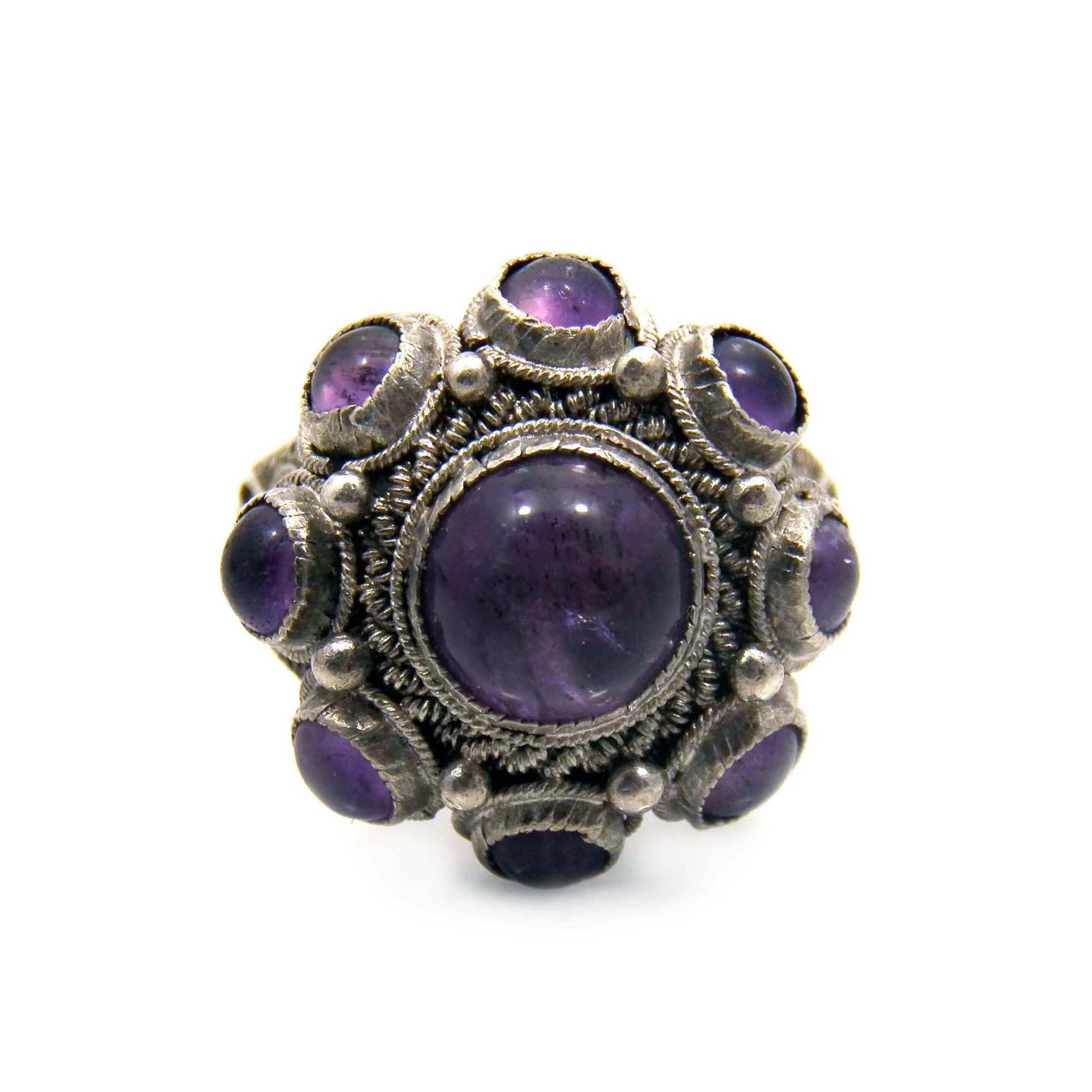 Chinese export ring is set with a natural amethyst cabochons