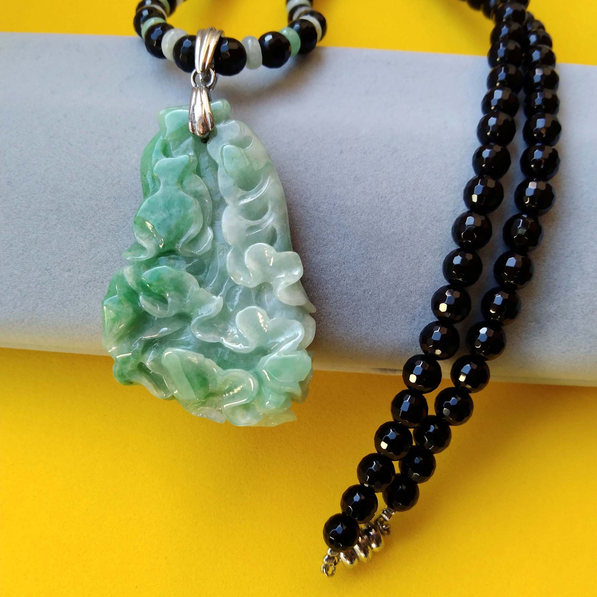 Carved Jade Pendant on Black Onyx Bead Necklace